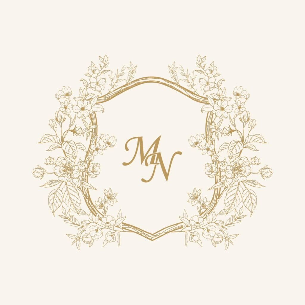 Custom wedding monogram with the initials "MN" surrounded by an elegant floral design.