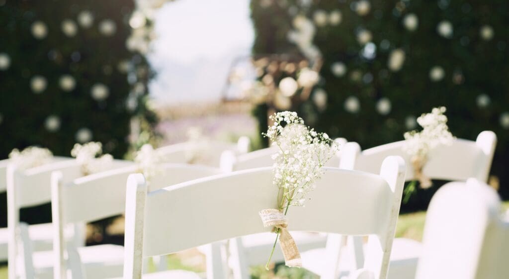 outdoor-wedding-venue-with-decorated-chairs.jpg