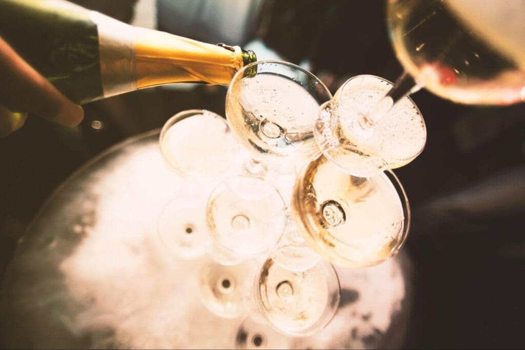 Champagne being poured into glasses