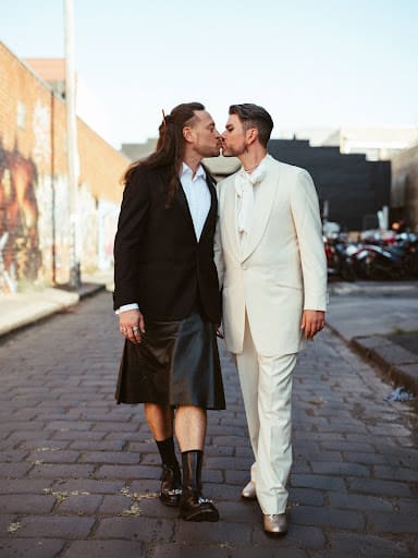 Aarron and Robert Kissing Each Other